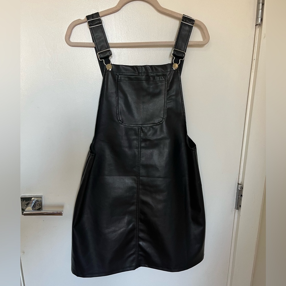 Black faux leather overall dress